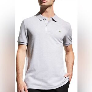 Lacoste light heather gray short sleeve polo. 2 button placket. Size XXL.
